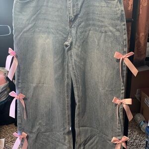 Women's Blue Jeans with Pink Bow Accents